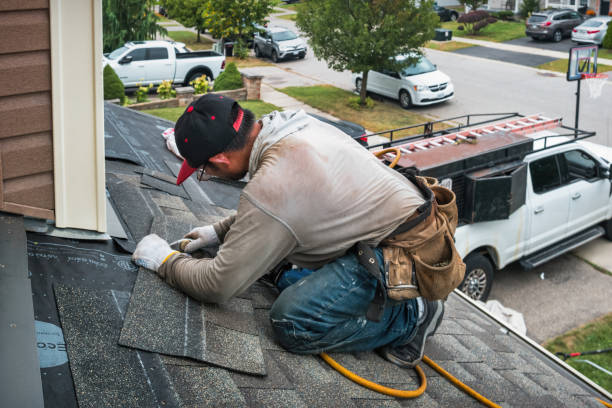 Professional Roofing technician working in Hamlin, NY